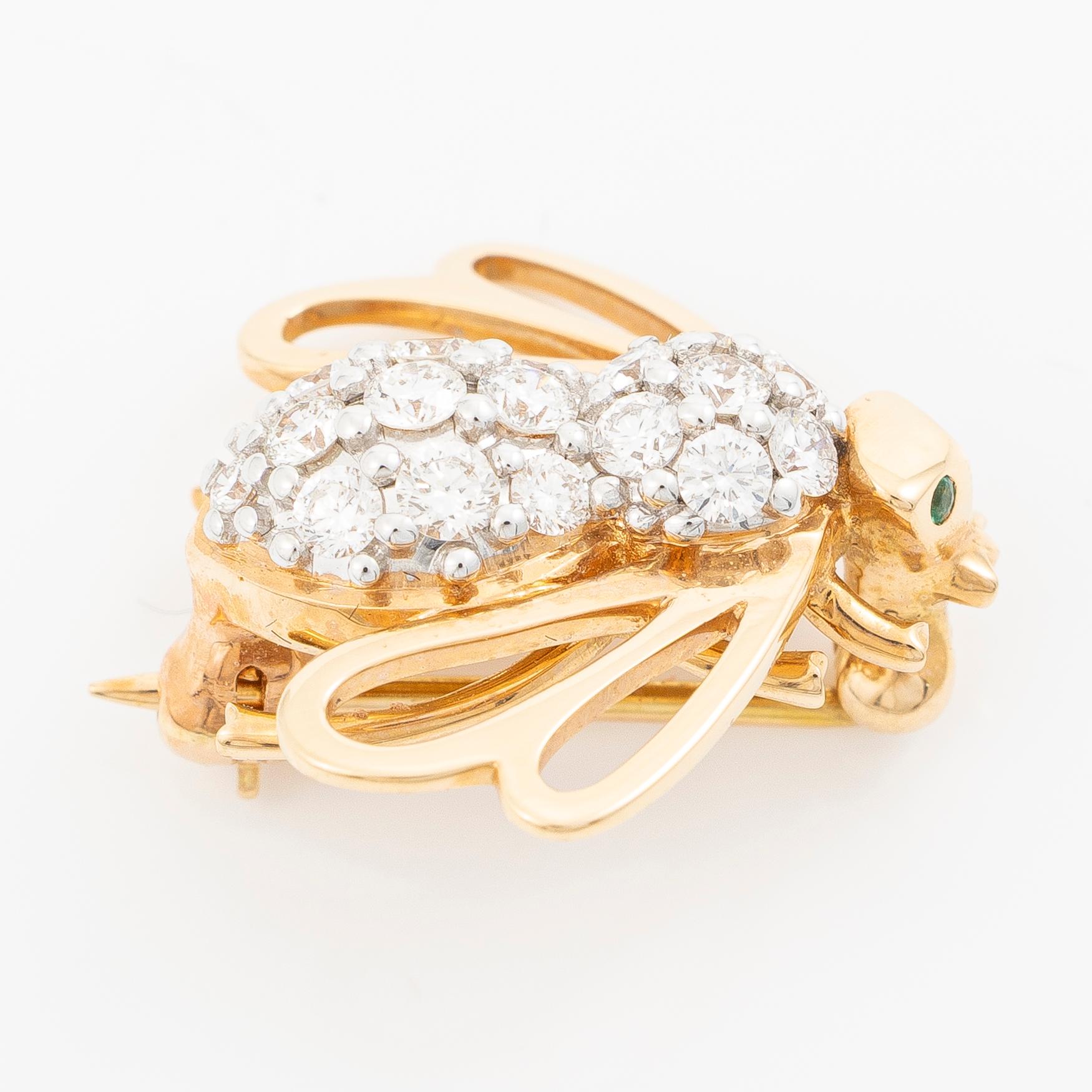 Brosch, Jarl Sandin/ Mary Kay, i form av bi, 18K guld med briljantslipade diamanter.