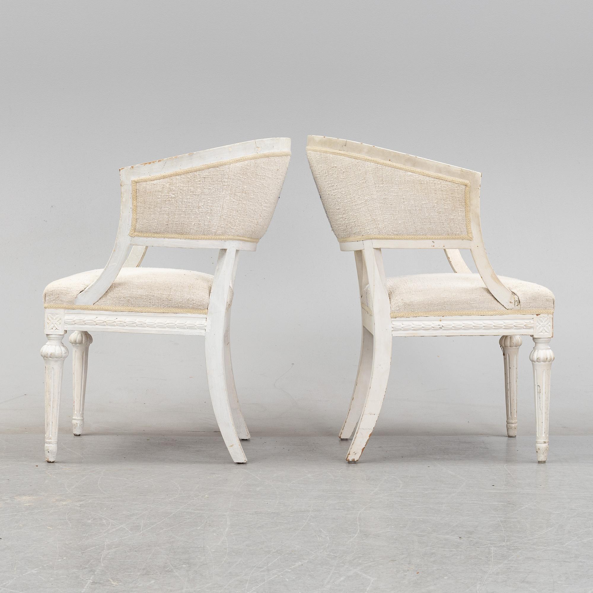 A pair of Gustavian style armchairs from around year 1900.