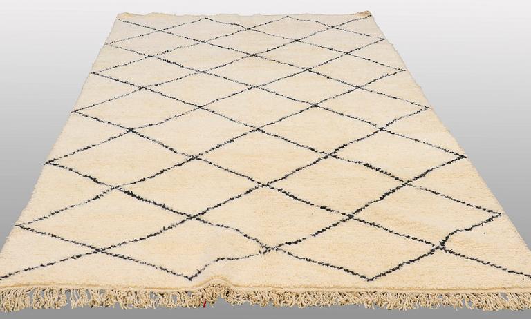 A moroccan rug, 330 x 210 cm.
