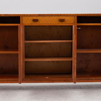 A ahogany-veneered 1940's/50's bookcase.