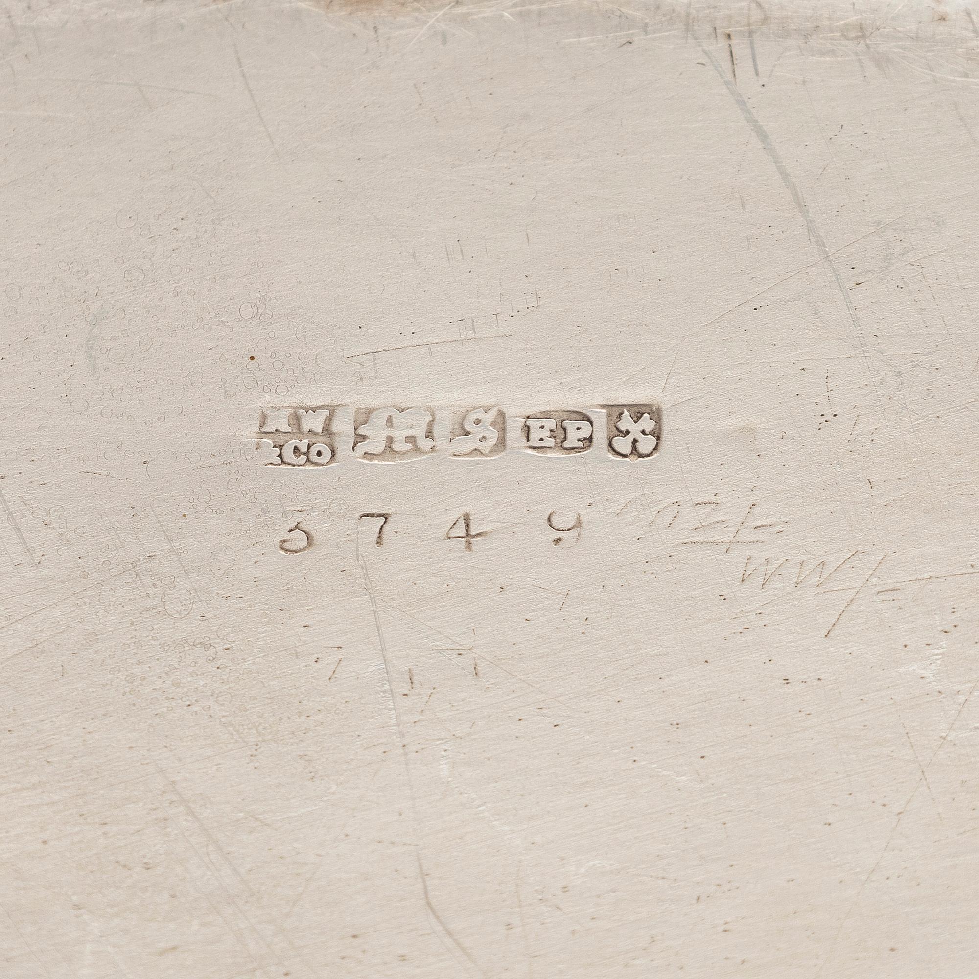 A set of four silver plated entree dishes, England.