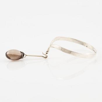 Vivianna Torun Bülow-Hübe, a bracelet with pendant, sterling silver and smoky quartz, for Georg Jensen.