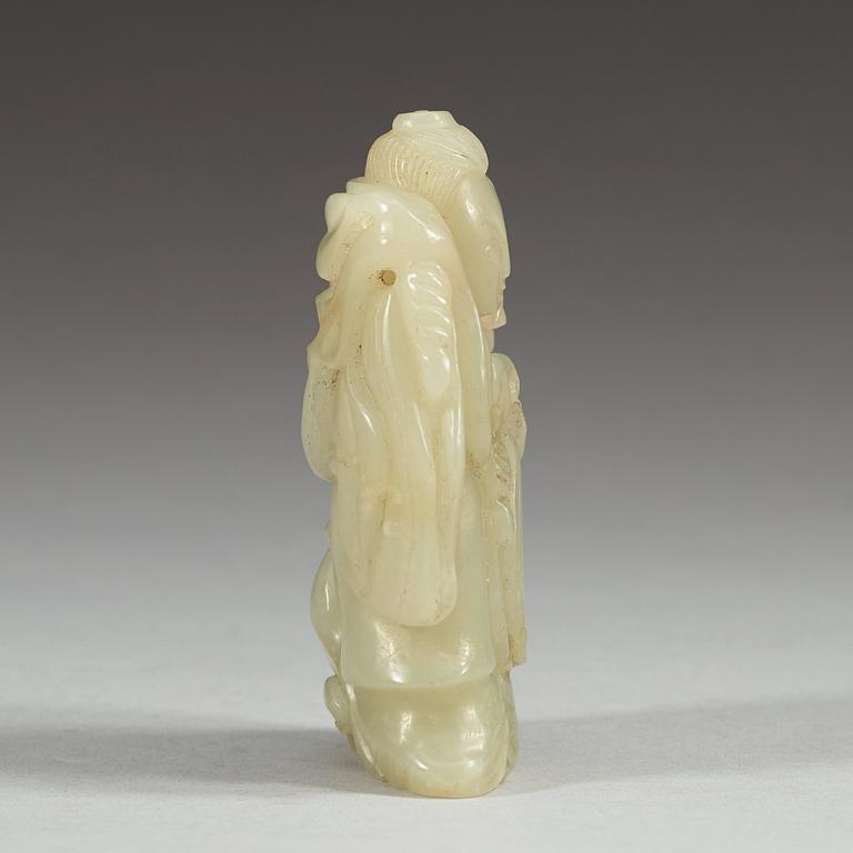A nephrite figurine of a lady with a duck, Qing Dynasty (1644-1912).