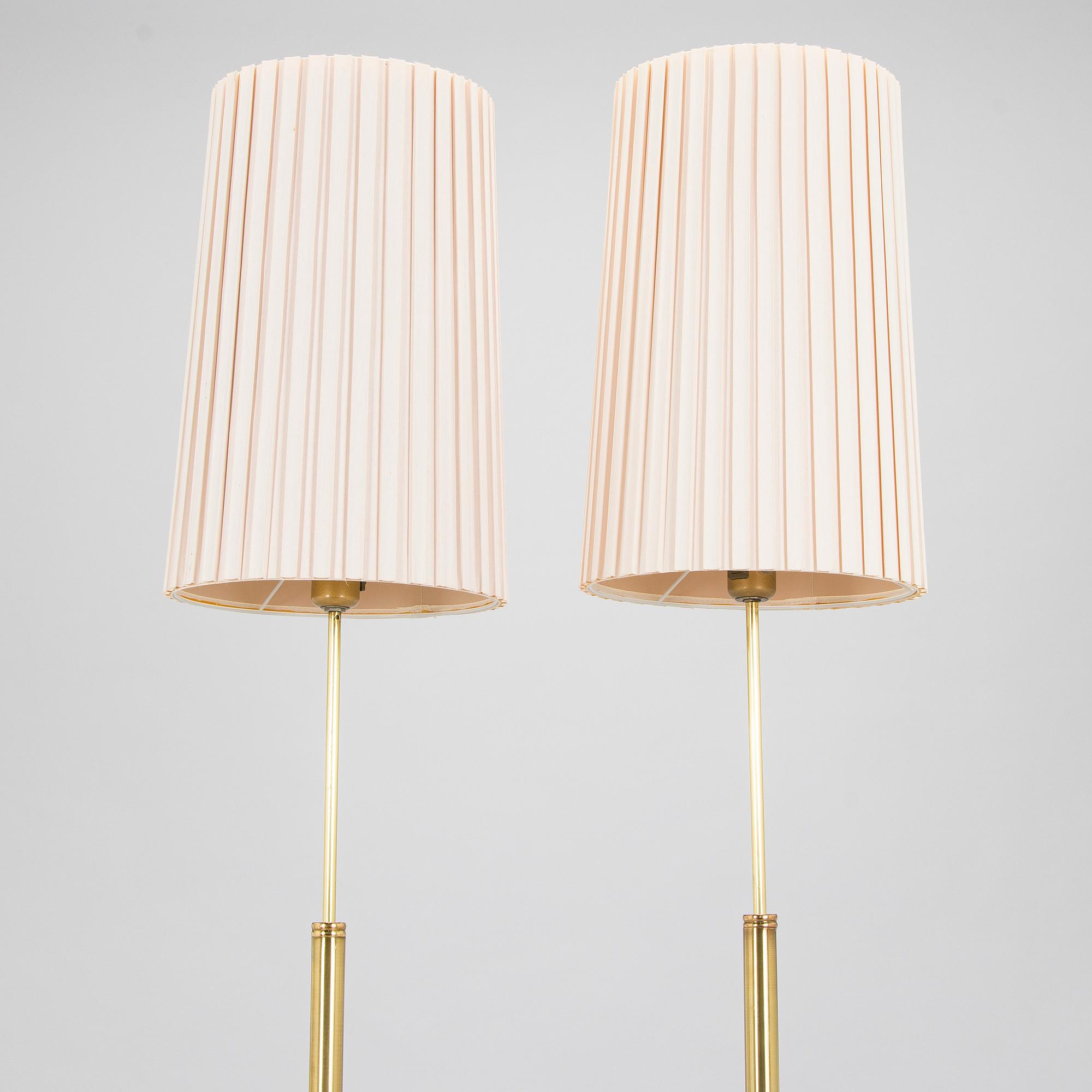 A pair of late 20th century floor lamps.