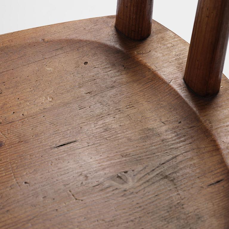 Axel Einar Hjorth, a set of four stained pine "Utö" chairs, Nordiska Kompaniet, Sweden, 1930s.