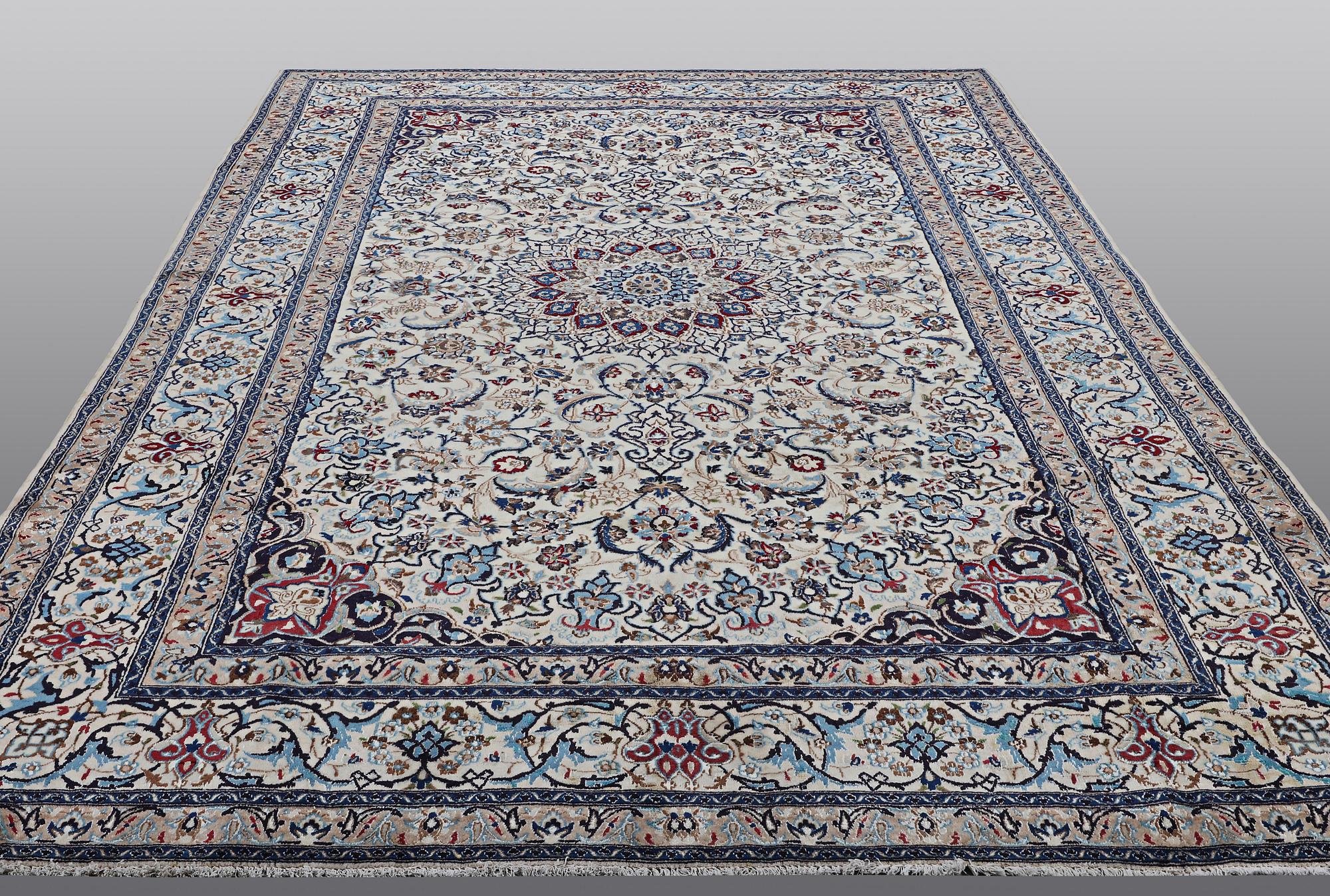 A carpet, Nain, so called 9 laa, part silk, ca 360 x 240 cm.
