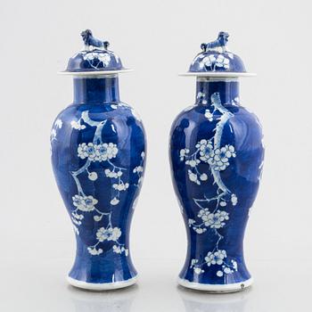 A pair of vases with covers, China, late Qing dynasty.