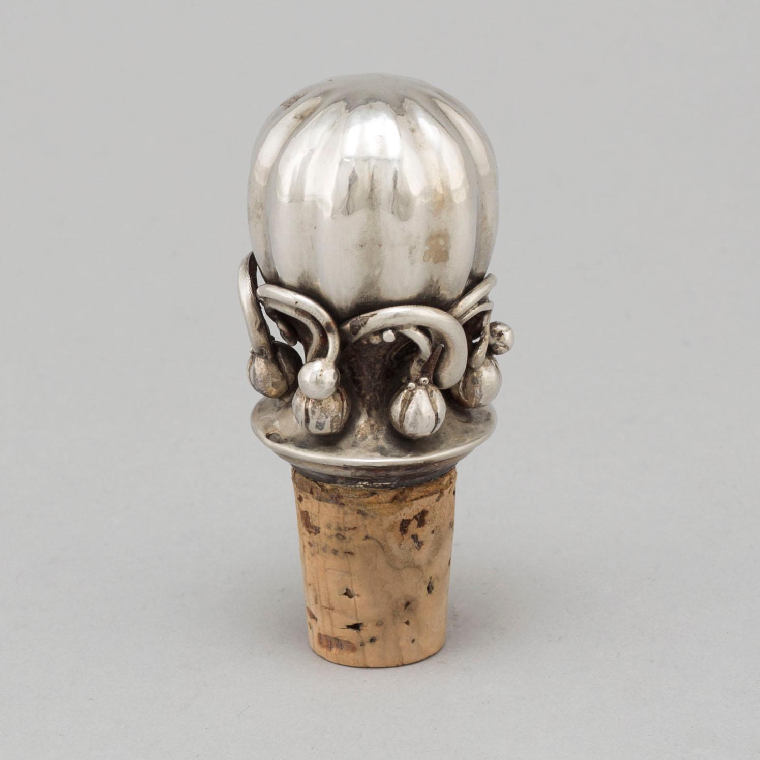 GEORG JENSEN, a silver plug for a decater, Denmark, 1915-27.