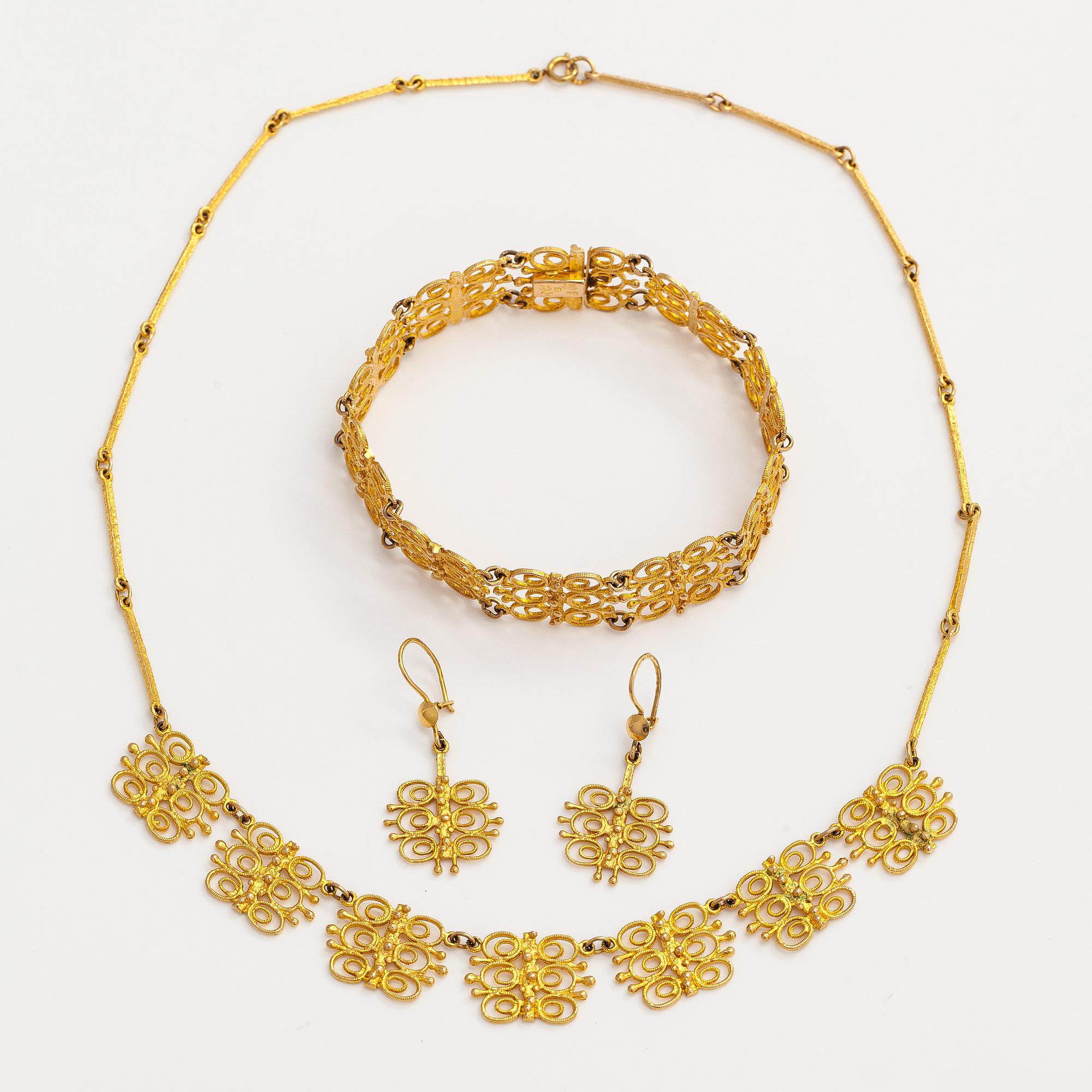 Esko Raitanen, collier, armband och örhängen, 14K guld, Helsingfors 1972.