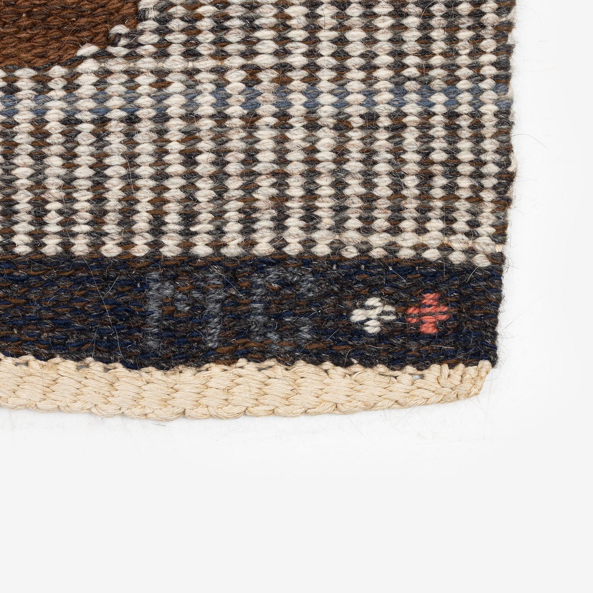 Margareta Grandin-Nettles, a flat weave carpet, c. 305 x 250 cm, signed GLH MG.