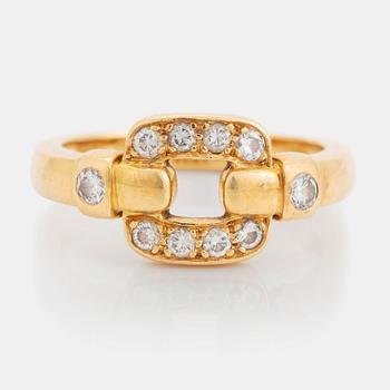 484. An 18K gold Cartier ring set with round brilliant-cut diamonds.