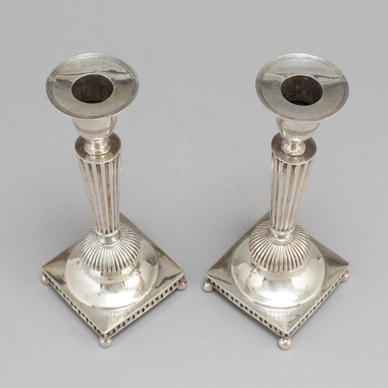 A Swedish pair of early 19th century silver candlesticks, mark of Petter Adolf Sjöberg, Stockholm 1813.