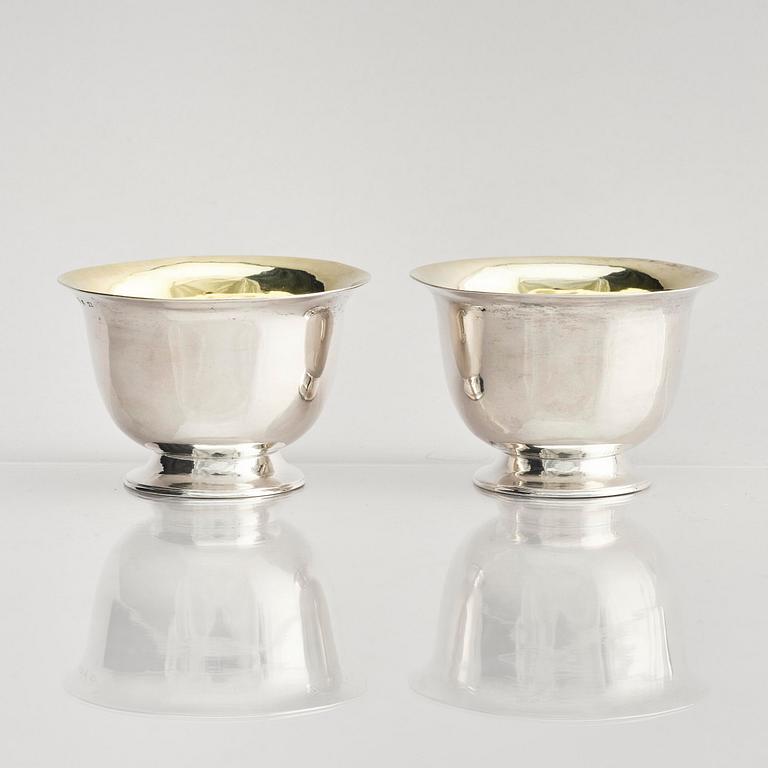 A pair of Swedish parcel-gilt silver dessert bowls with stand, mark of Gustaf Möllenborg, Stockholm 1830.