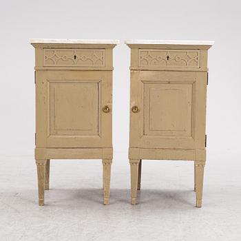 A pair of marble top bedside tables, Frederik Staermose Möbelfabrik, Odense, Denmark, first half of the 20th Century.