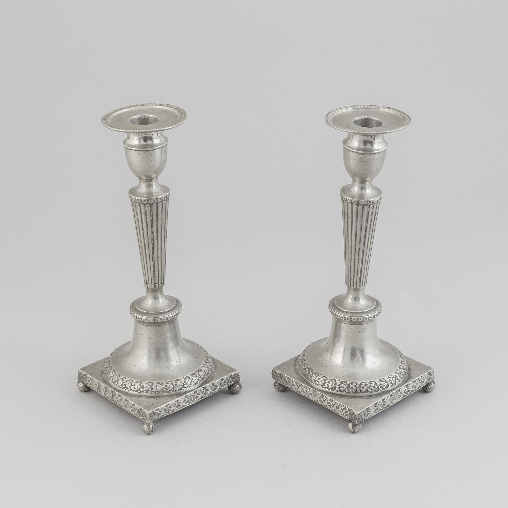 A pair of pewter candle stick by Anjou, Norrköping 1804.