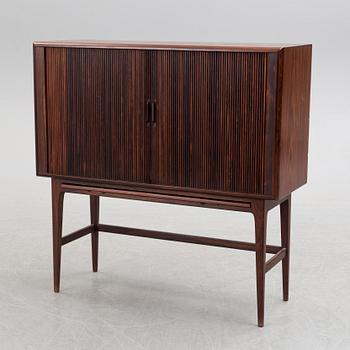 KURT ØSTERVIG, a Danish rosewood veneered drinks cabinet, 1960's.