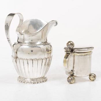 Sugar tongs, cream jug and miniature decanter, silver, including CG Hallberg, Stockholm 1955.