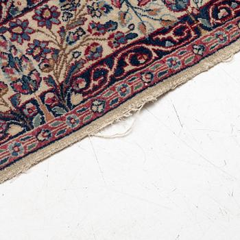 A semi antique Kirman rug, South Persia, c. 228 x 136 cm.
