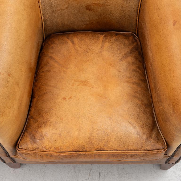 Club chairs, a pair, Bendic International, late 20th century.