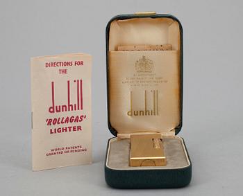 SYTYTIN, Dunhill "Rollagas", keltaista metallia, alkuperäisrasiassa, Made in Switzerland, 1970-luku.