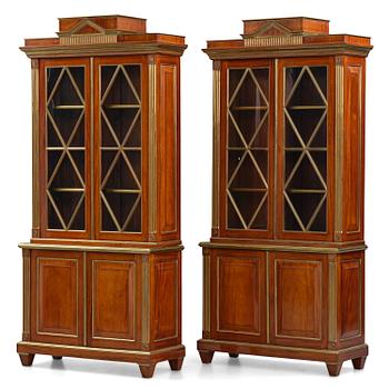 57. A pair of Russian mahogany and brass-mounted Jacob-style bibliothèques, modern with old parts.
