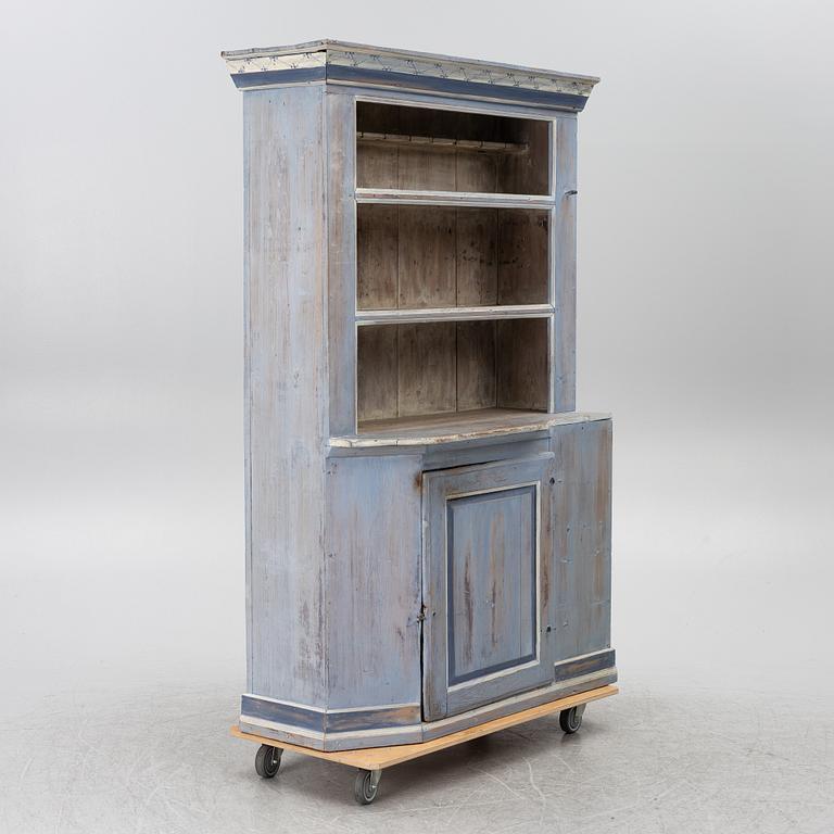A painted folk-art cupboard, early 19th century.