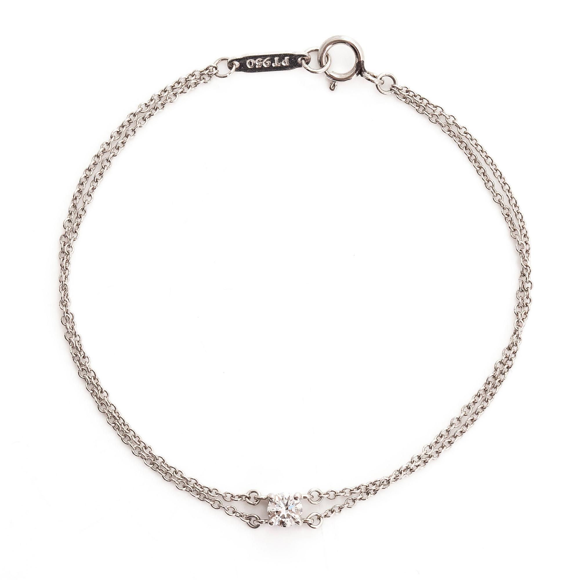 Tiffany & Co, rannekoru, platinaa ja briljanttihiottu timantti.