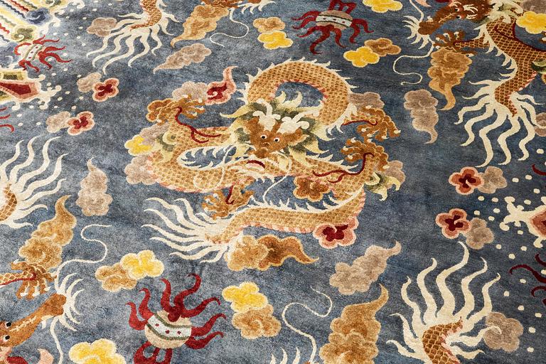 A semi-antique chinese ' Five dragon' silk carpet, c 335 x 254 cm.