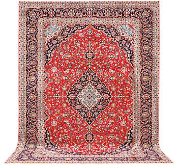 A Kashan carpet, c. 401 x 292 cm.