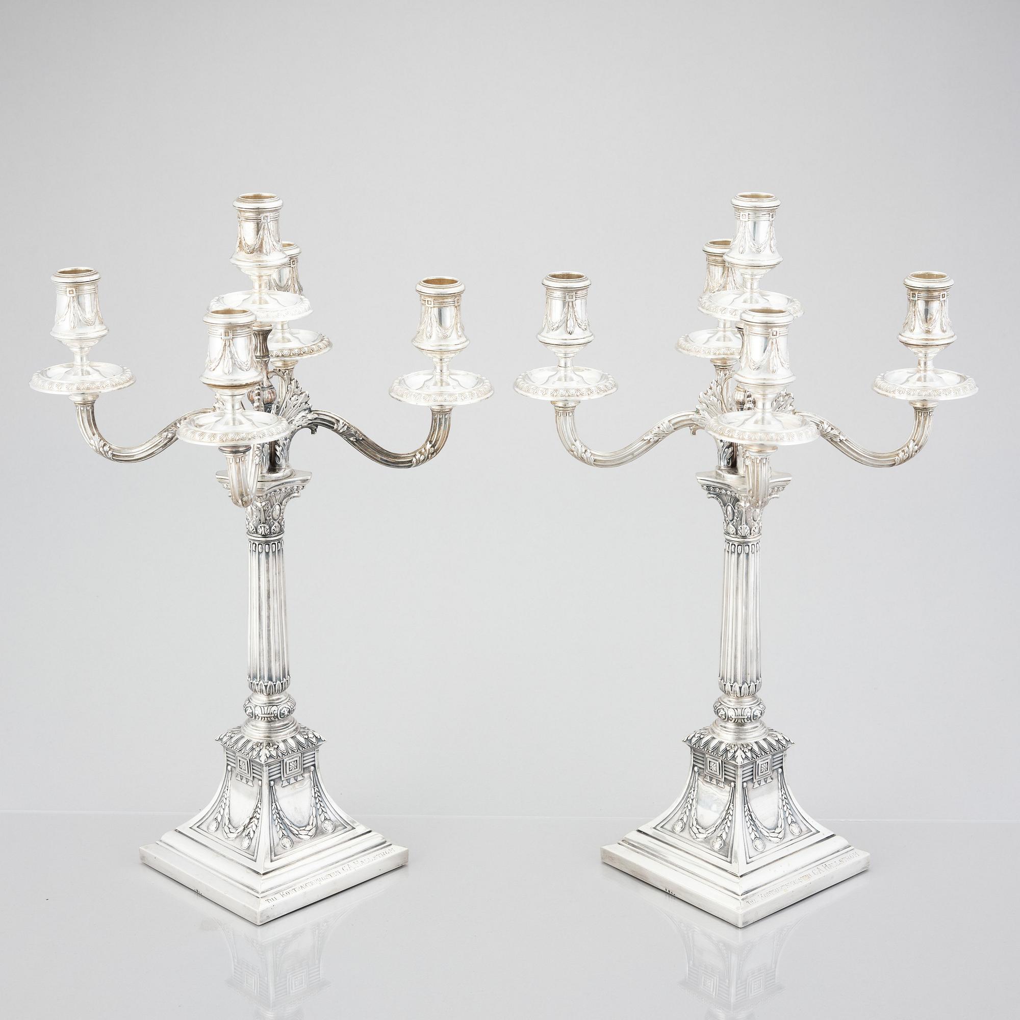 A pair of Swedish silver candelabras, mark of Svea Svensson, Stockholm 1908.