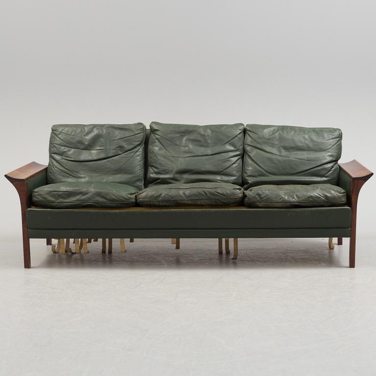 A 1960's Danish sofa, with 2 easy chairs and 2 tables by Glostrup.