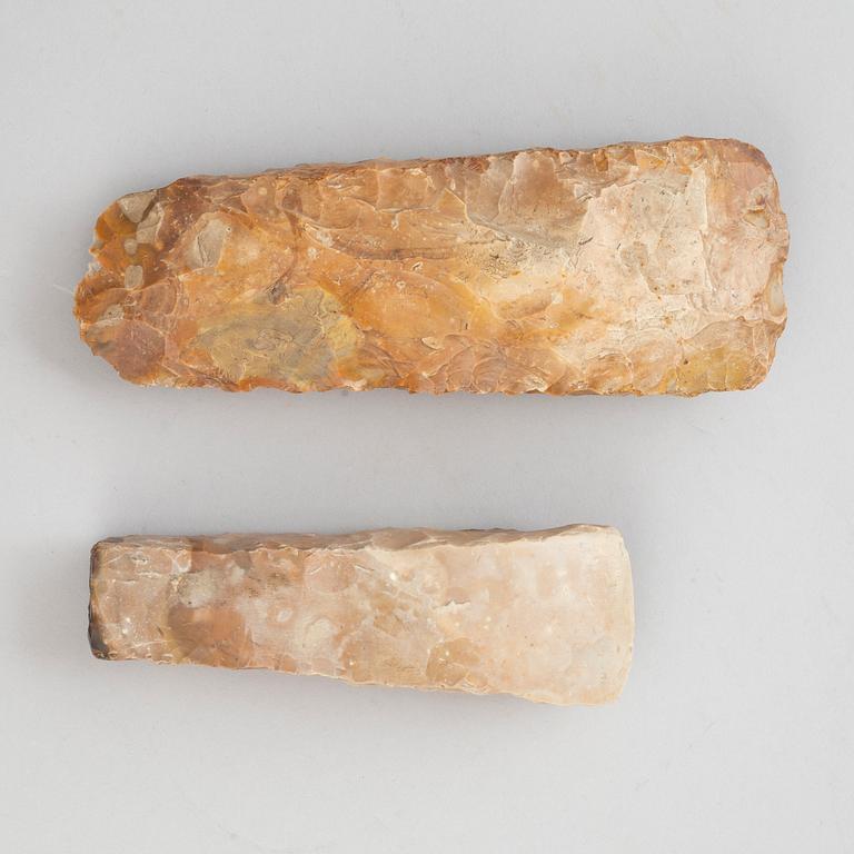 Two neolithic flint axes.