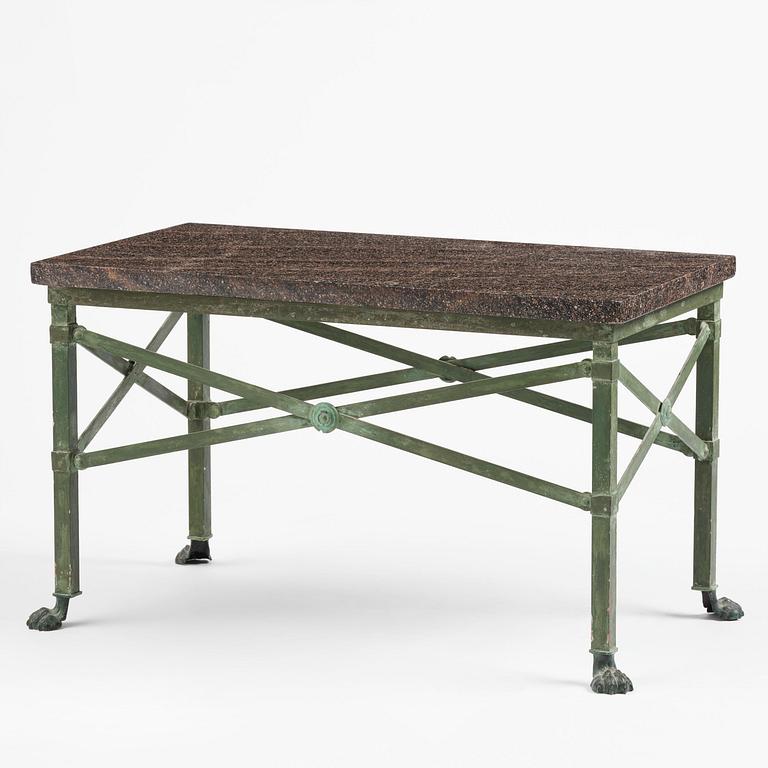 A table with Swedish 'Orrlok' porhyry top, early 19th century on a later bronze stand.