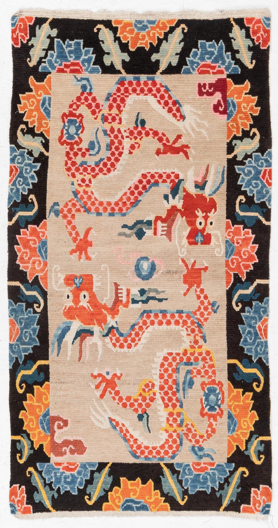 An antique rug, Tibet, circa 1900, approx. 157 x 83 cm.