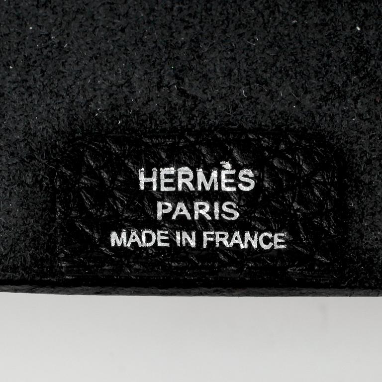 HERMÈS, a black leather notebook, "Moyen Modèle".