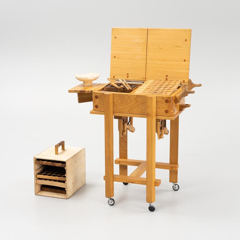 Magnus Ek, a oak wood praline trolley, Oaxen Krog, 2019.