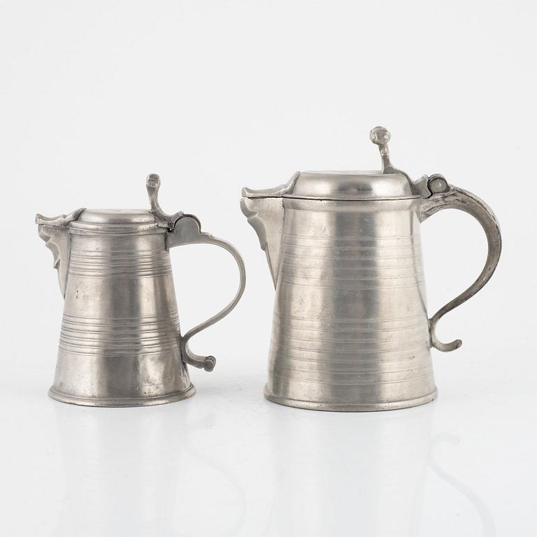 Two pewter jugs, mark of O. Artedius and S. Pilström, Jönköping 1761 respectively Örebro 1772.