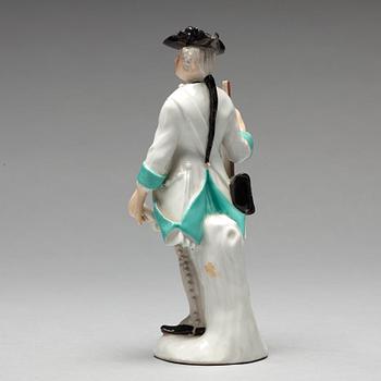 A German unmarked porcelain figure of a huntsman, 18/19th Century.