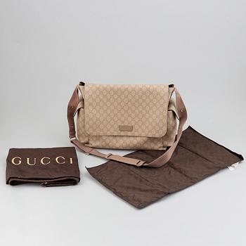 Gucci, skötväska.