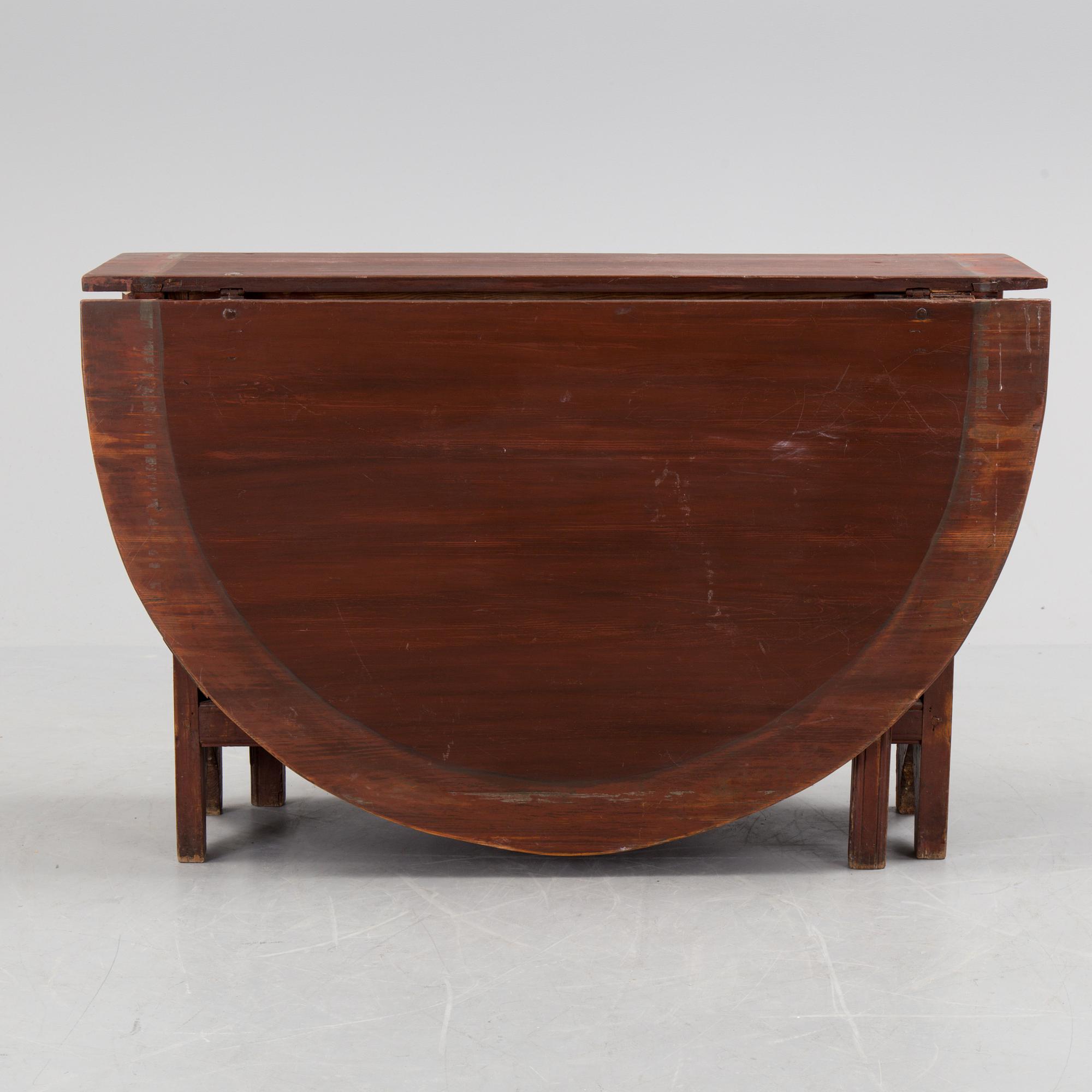 A 19th century painted flap table.