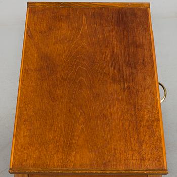 A 'Gunilla' mahogany bedside table from Nordiska Kompaniet, 1943.