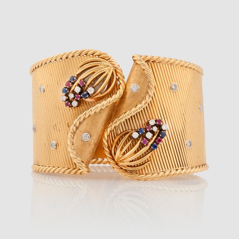 A Gübelin ruby, sapphire and brilliant-cut diamond bracelet with a hidden watch.