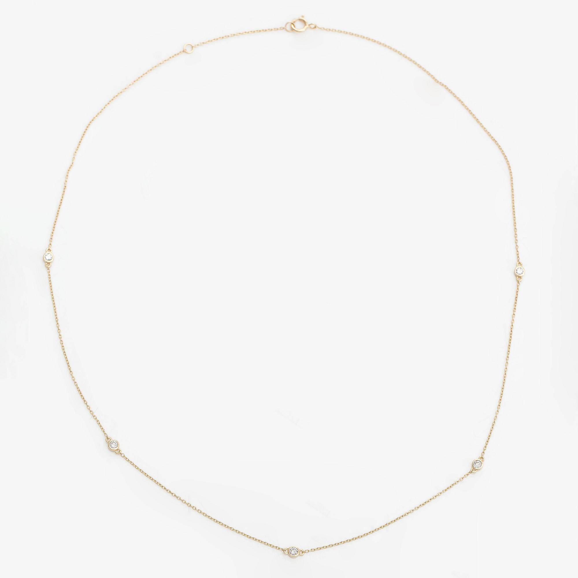 Halsband, 14K guld och diamanter ca 0.15 ct totalt.