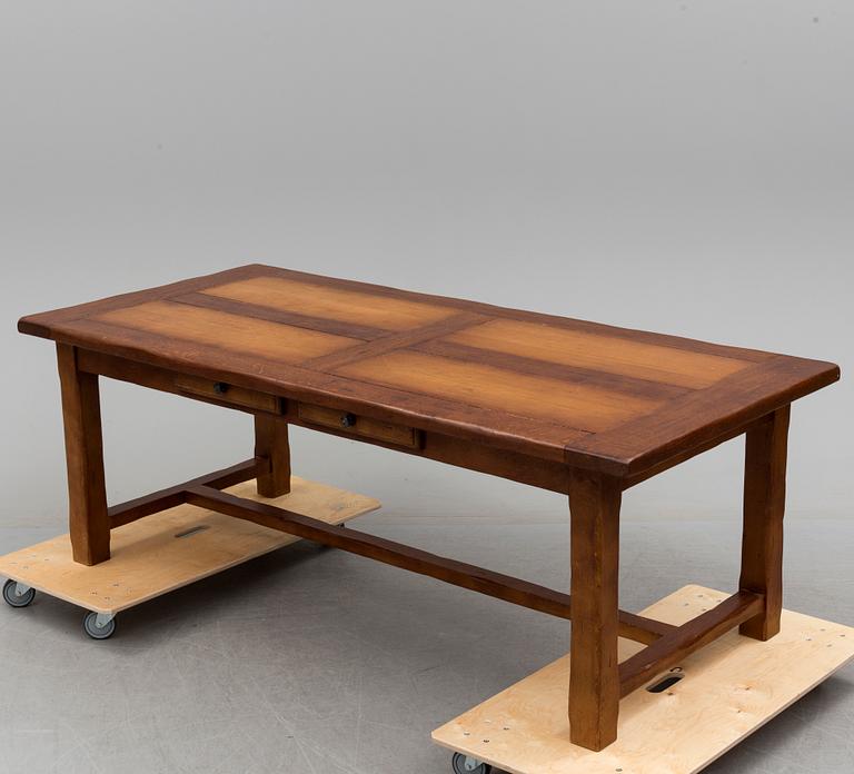 A circa 2000 dinner table by Engelsson.