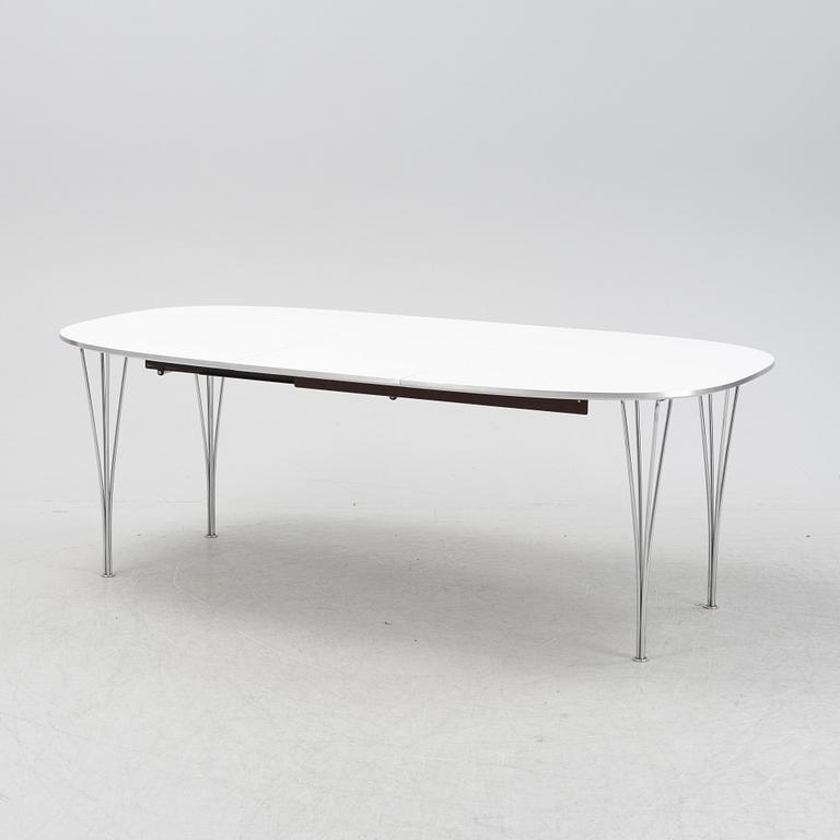 A 'Super elliptical' dining table by Bruno Mathsson & Piet Hein, from around the year 2000.