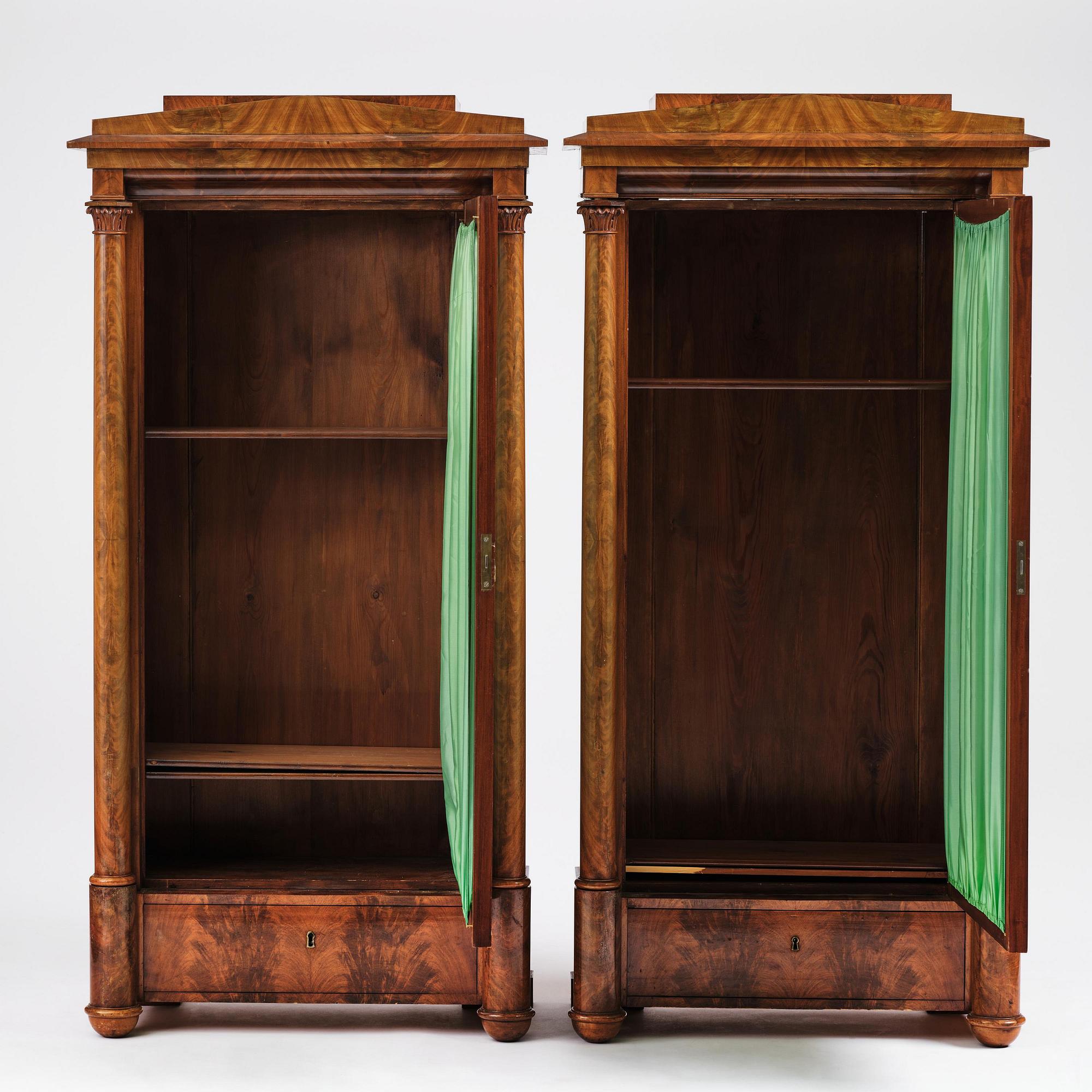A pair of Swedish Empire mahogany bibliothèques, Stockholm, early 18th century.