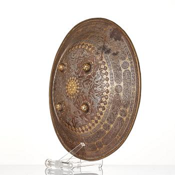A gold-damascened steel shield, Qajar Iran, 19th century.