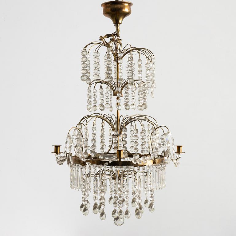 A four-light Gustavian-style chandelier, circa 1900.