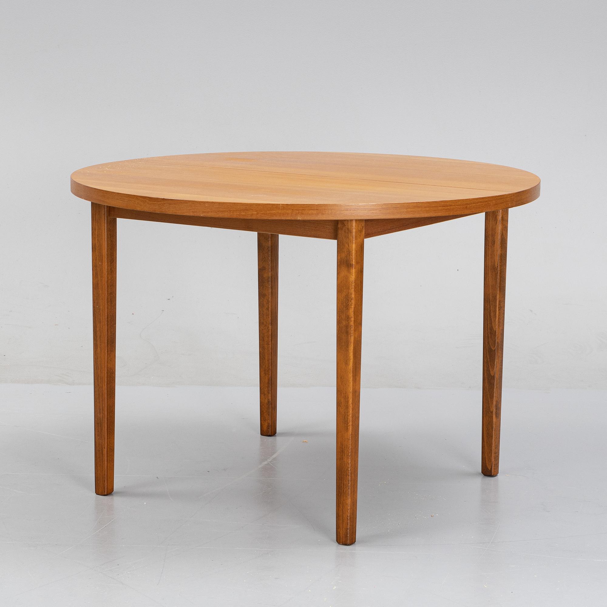 A teak dining table, second half of the 20th century.