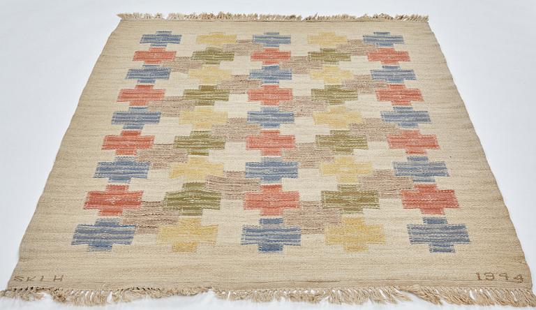 Swedish design, a carpet, knotted pile in relief, ca 178,5-179,5 x 137-140,5 cm, signed and dated at the back: SKLH 1944.